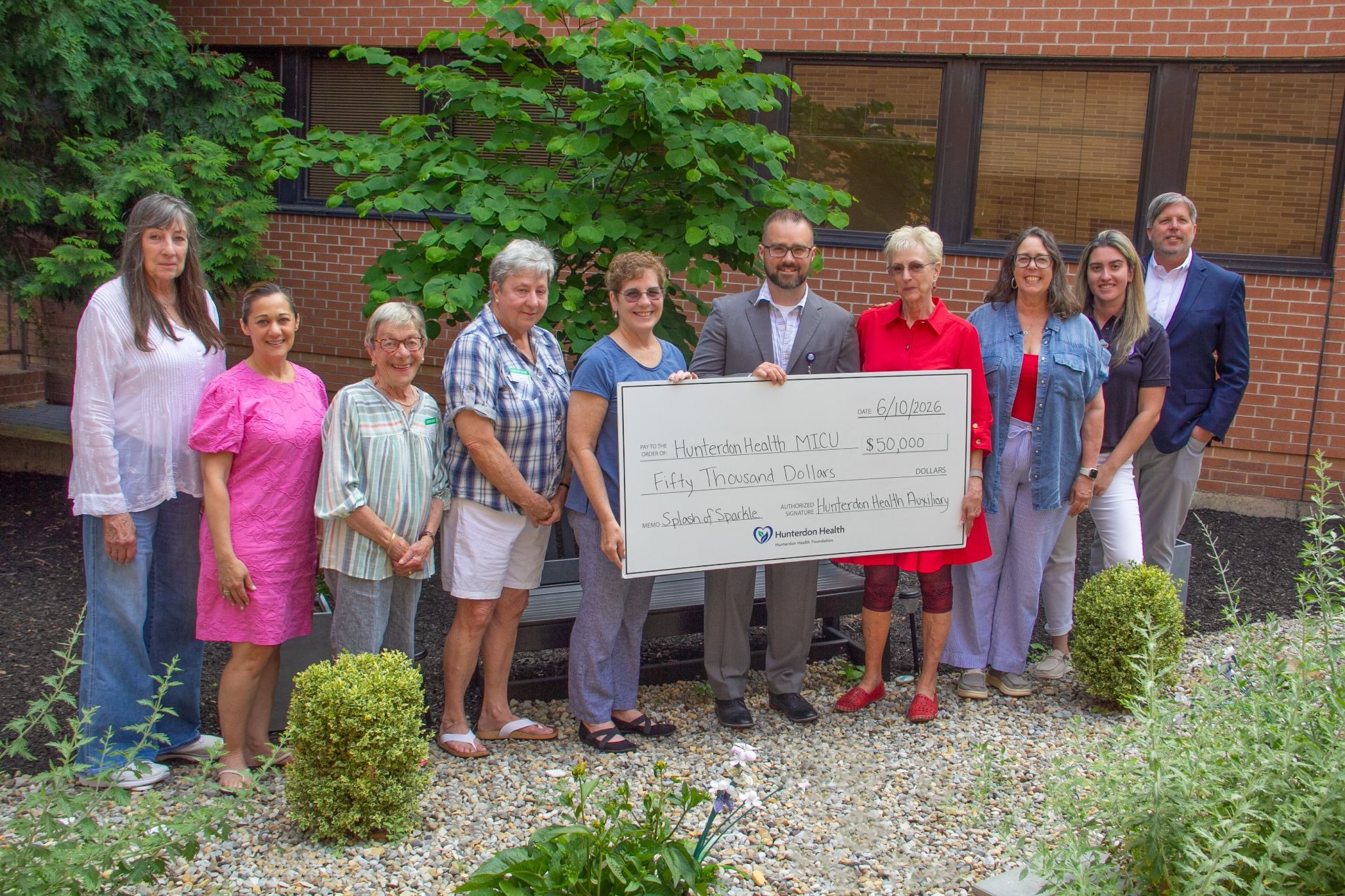 Hunterdon Health Auxiliary presents check to Hunterdon Mobile Intensive Care Unit