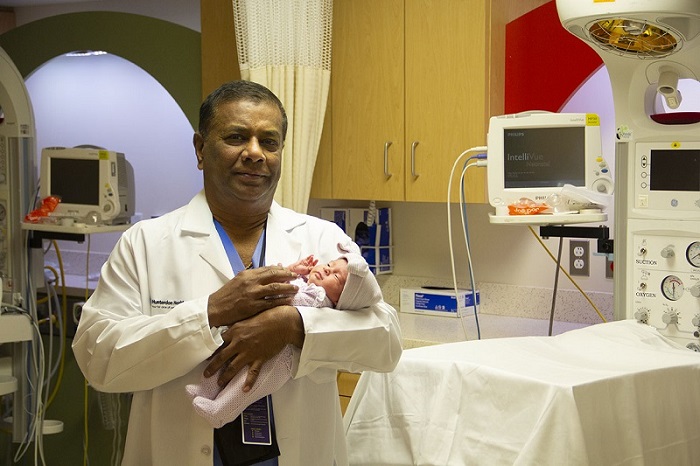 Dr. Veerappan with Infant