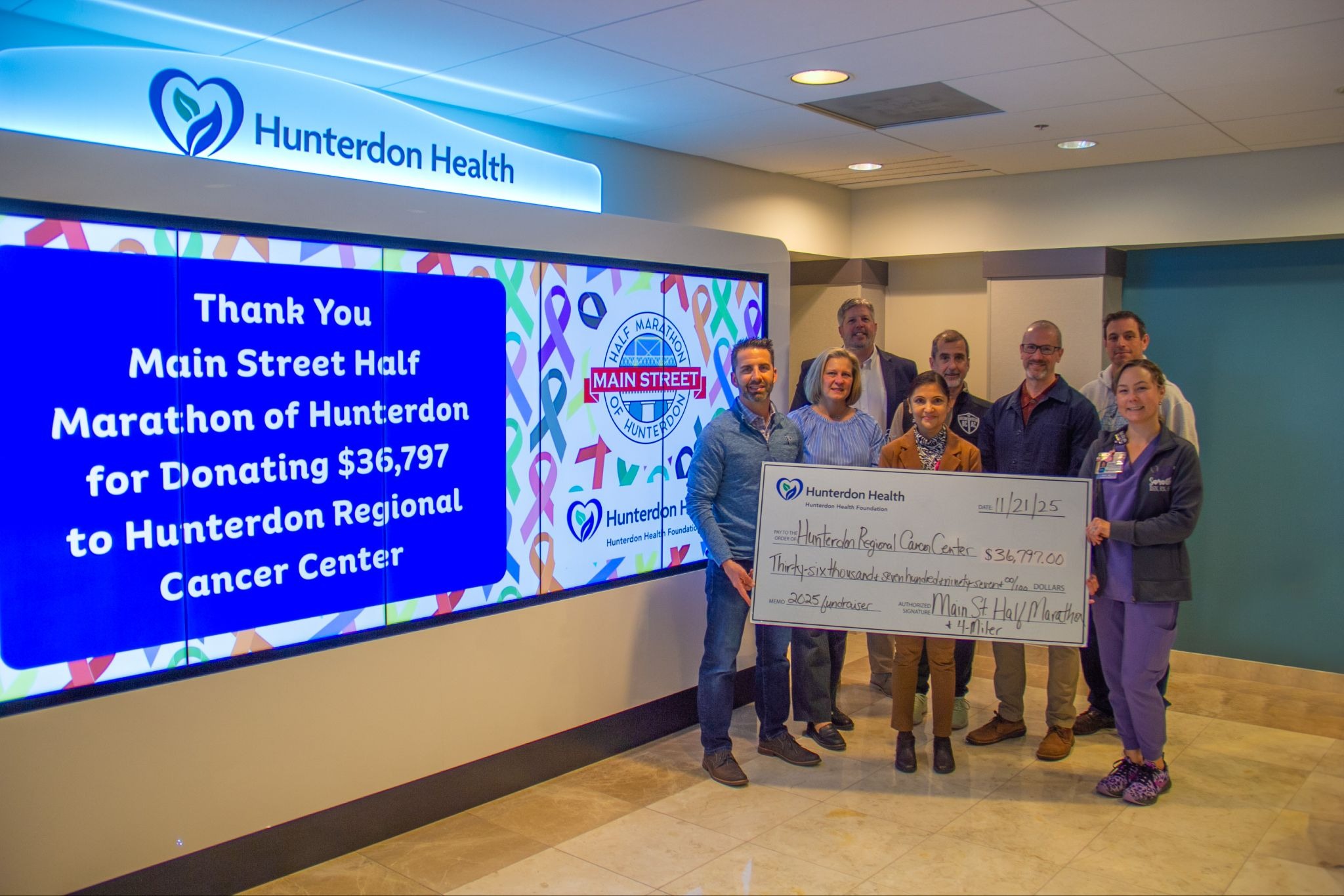 Main Street Half Marathon presents $36,797 check