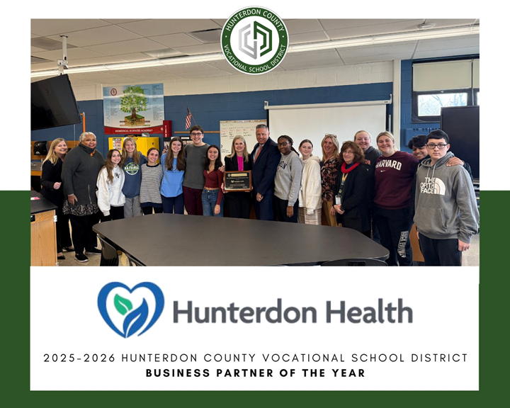 A group of students pose for a picture with Hunterdon Health staff.