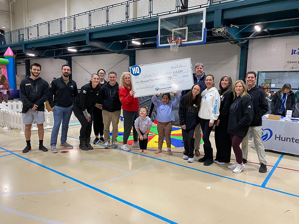 HealthQuest gives $2,250 from their Family Fun Night in January