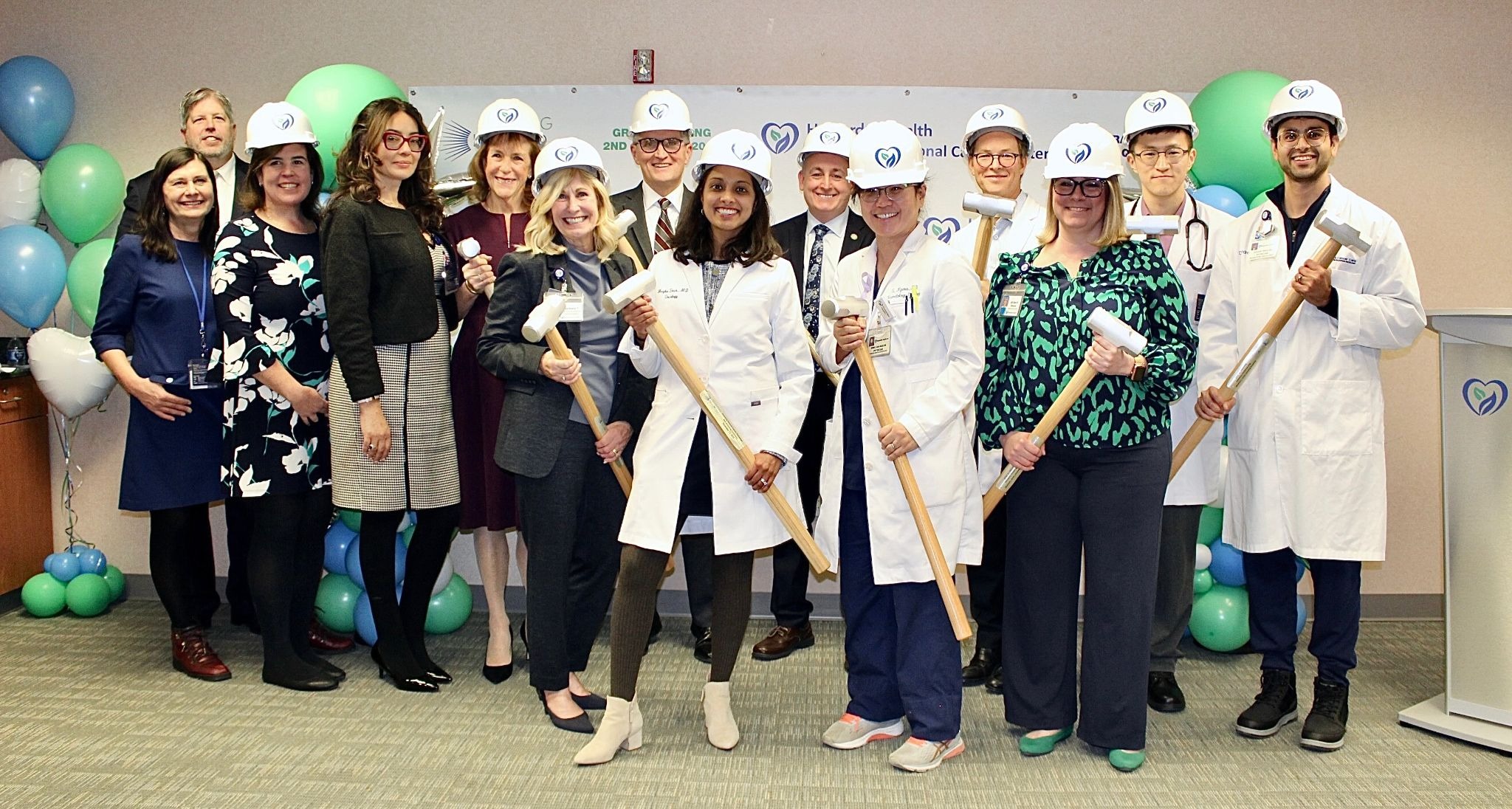 Cancer Center Staff, Foundation Board Members, and Leadership Team kick off Beaming Beyond Cancer Campaign at Wall Breaking Ceremony