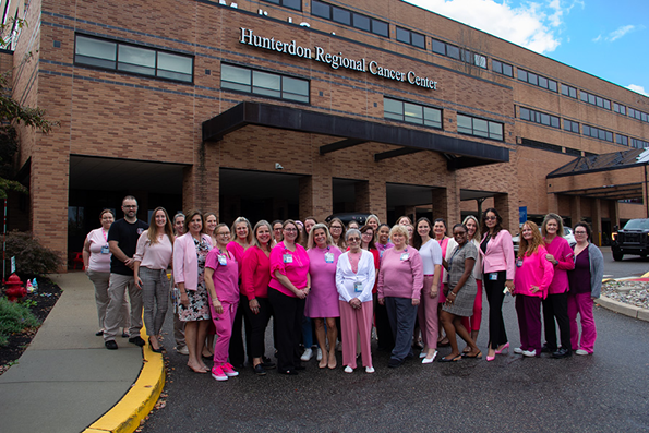 Photo of Hunterdon Health employees dressed in pink for breast cancer awareness.