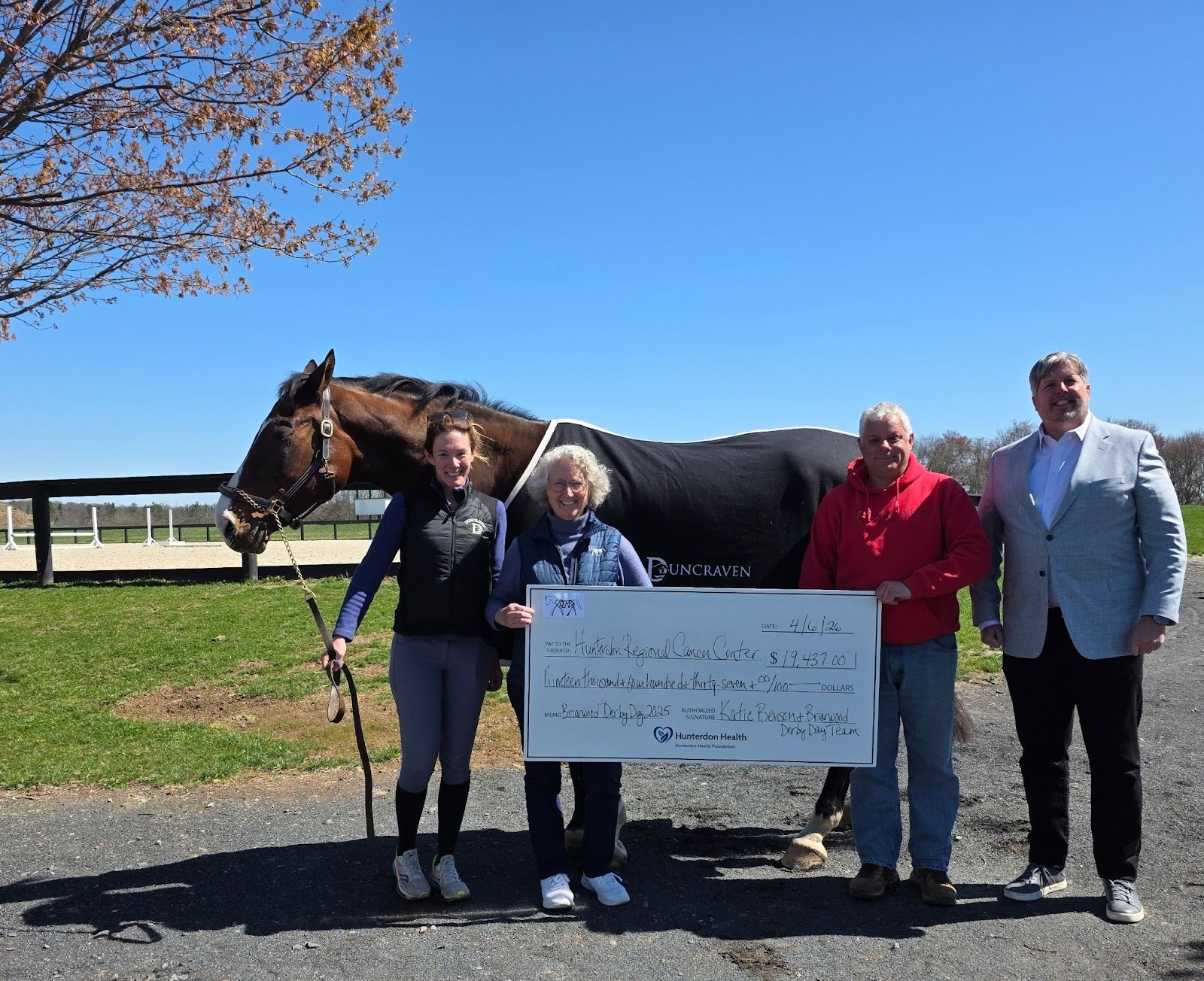 Briarwood Derby Day team presents check to Hunterdon Health Foundation