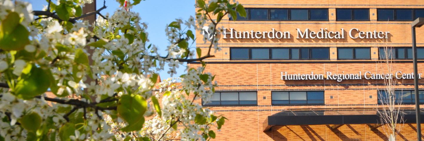 Photo of the Hunterdon Medical Center Building with Medical Center Sign and Cancer Center Sign