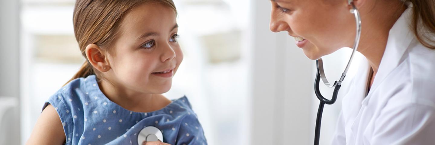 Child talking to medical staff