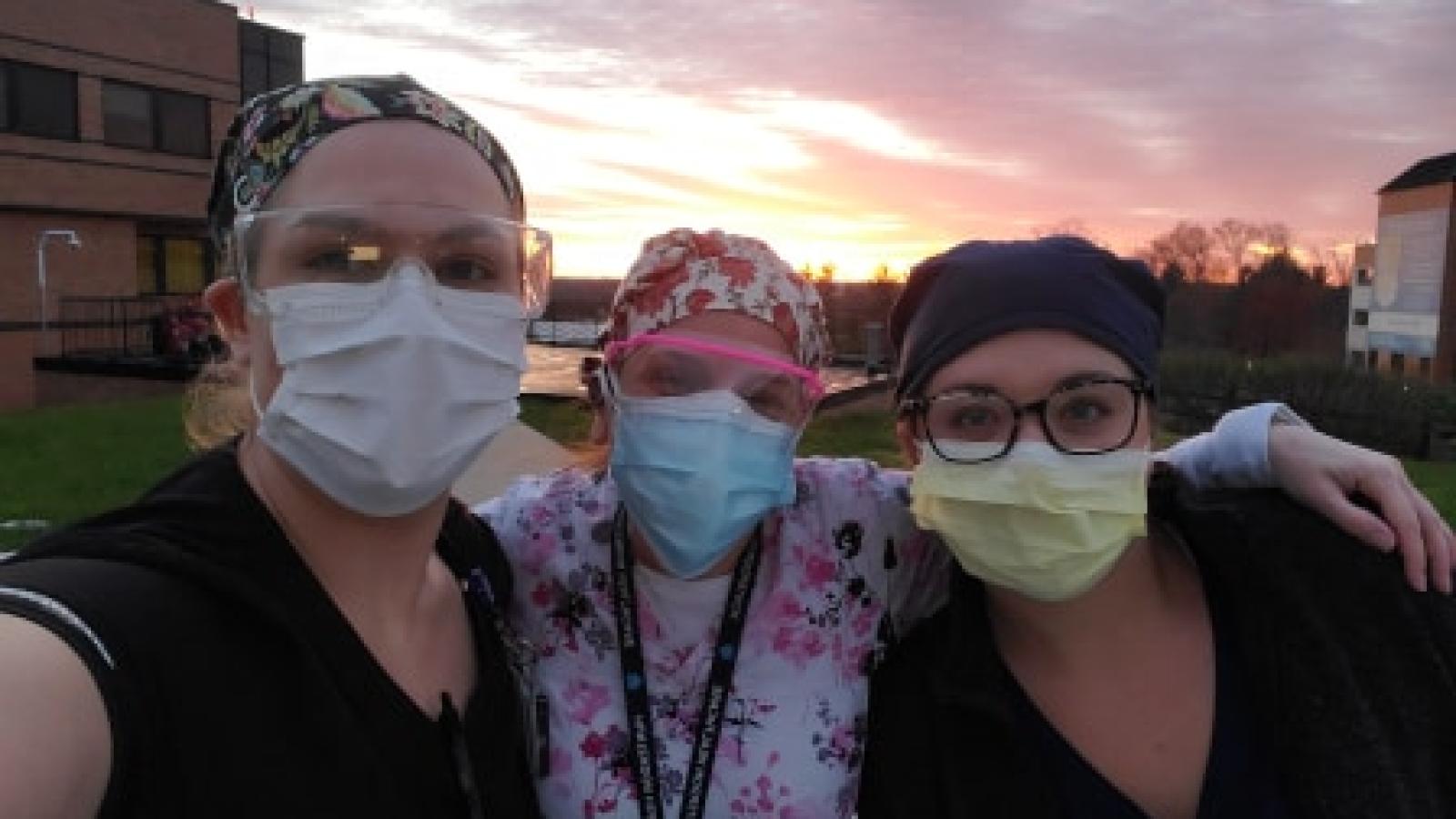 Nurses gather at sunrise