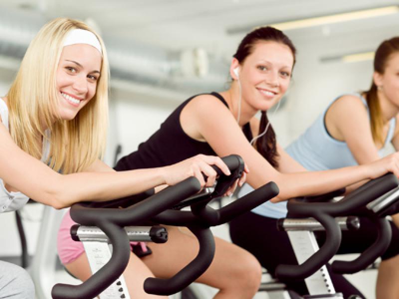 Members enjoy cycling class