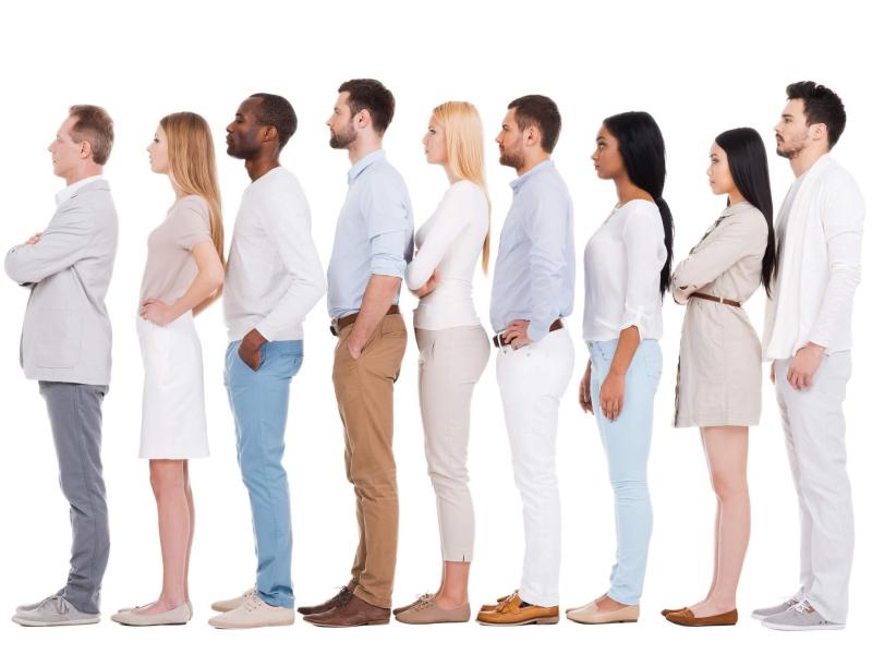 Several people standing straight