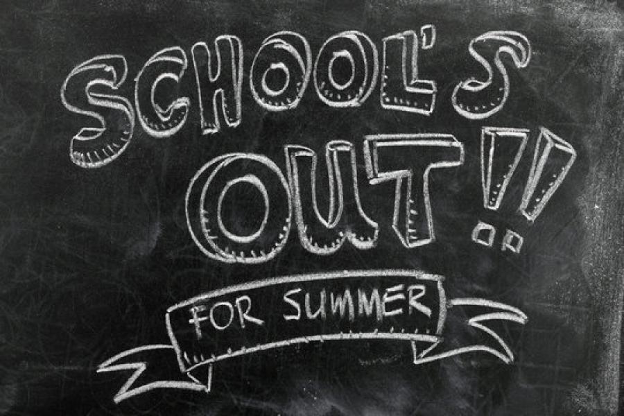 School is Out written on chalkboard