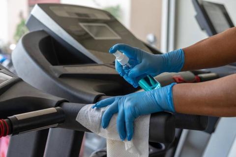 Staff clean the fitness equipment at the Hunterdon Health and Wellness Centers