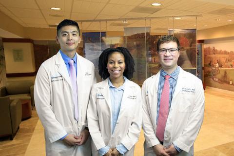 A group of pharmacy residents gather for a photo