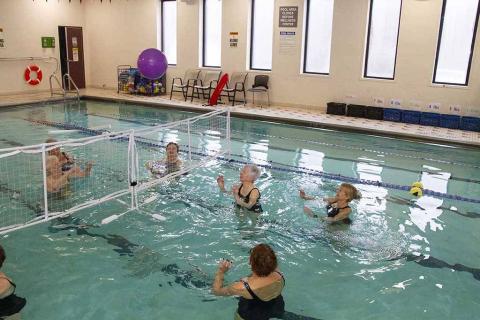 Members playing Water Volleyball at Whitehouse Station