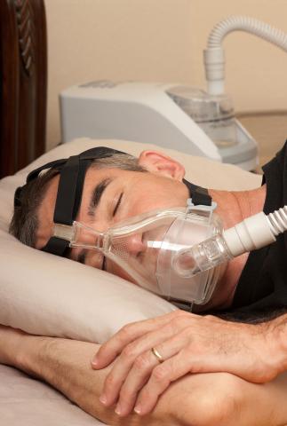 Sleep Apnea Machine on man