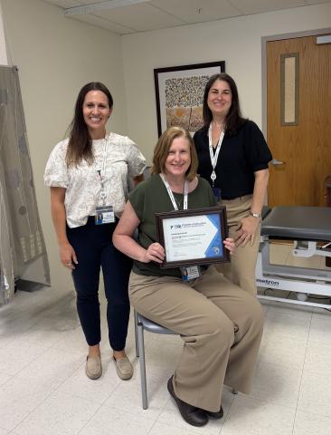 Oncology Rehab staff with award.